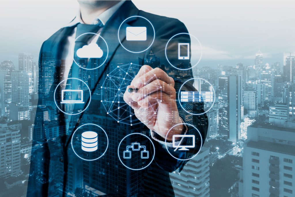 Double exposure of businessman connected devices with world digital technology internet and wireless network on touch screen and city of business background in business and technolog
